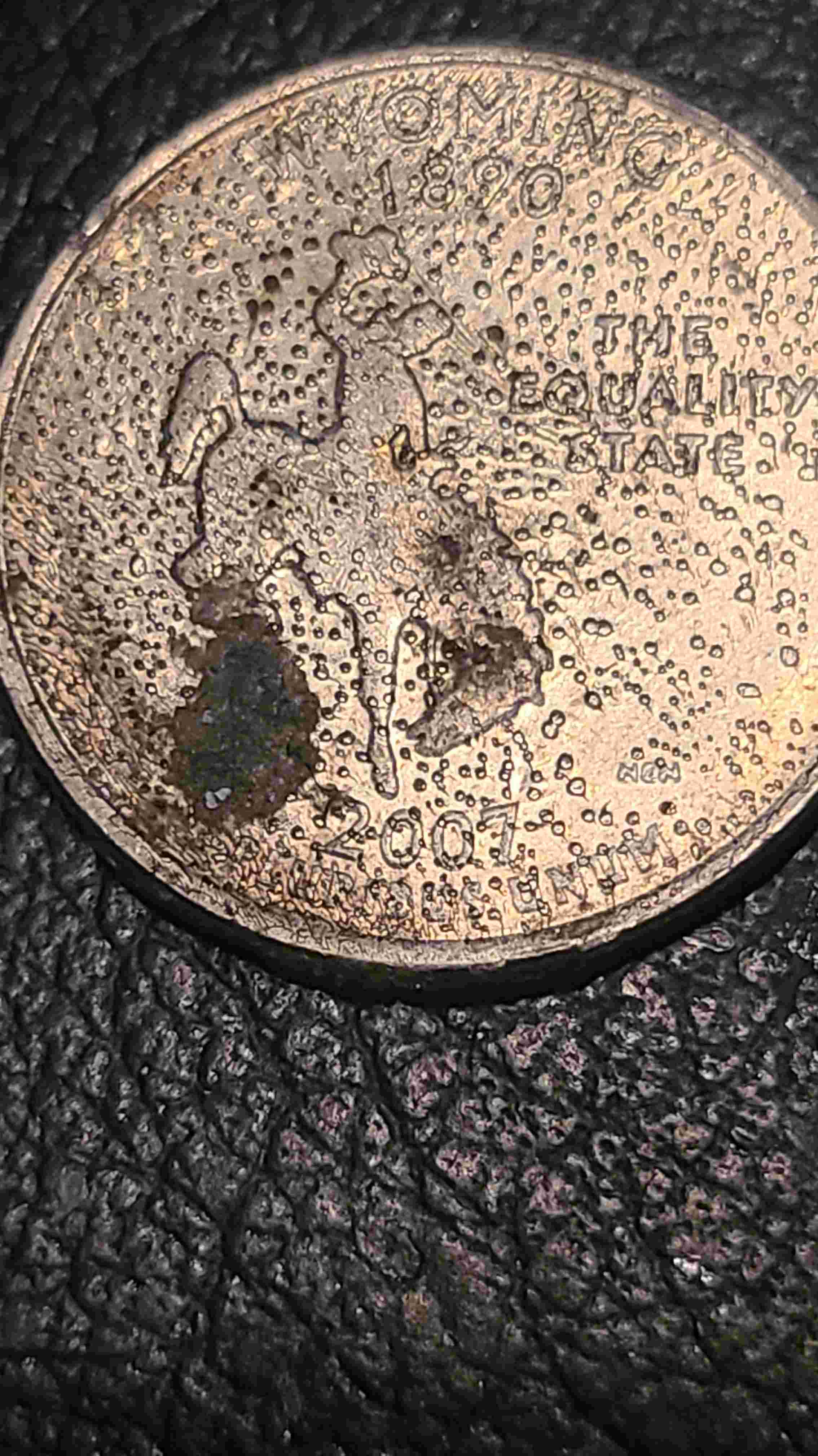 What-Is-Heck-Is-This-Error-Coin?-Wyoming-Quarter-With-Dots-2007